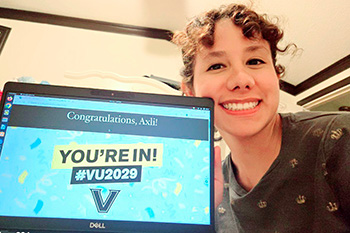 Axli Alvarez showing computer screen with "You're In!" message from Vanderbilt University